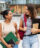 Two young women walking to class