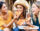 women eating pizza